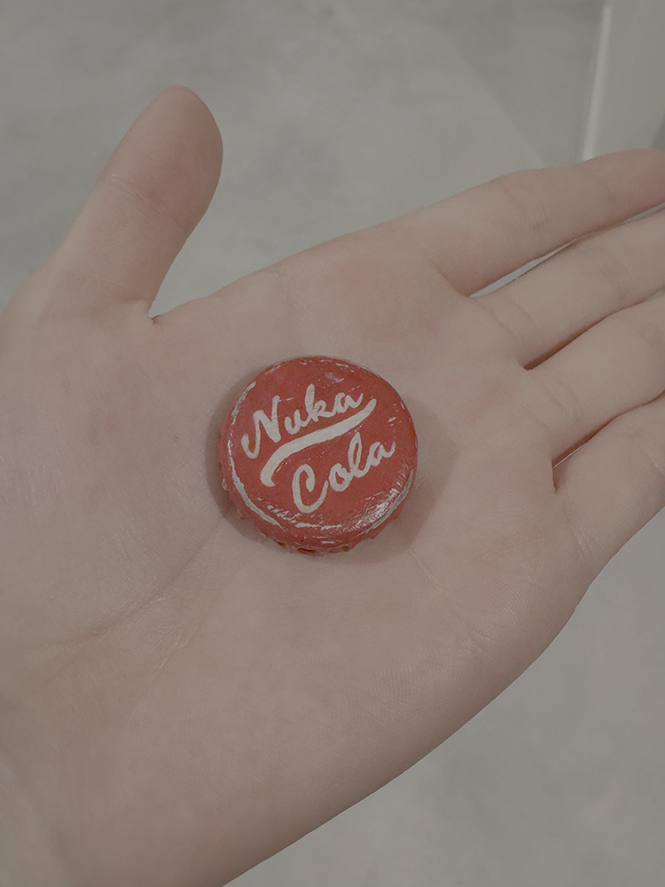 Sculpture of a Nuka Colo bottlecap from the game Fallout.